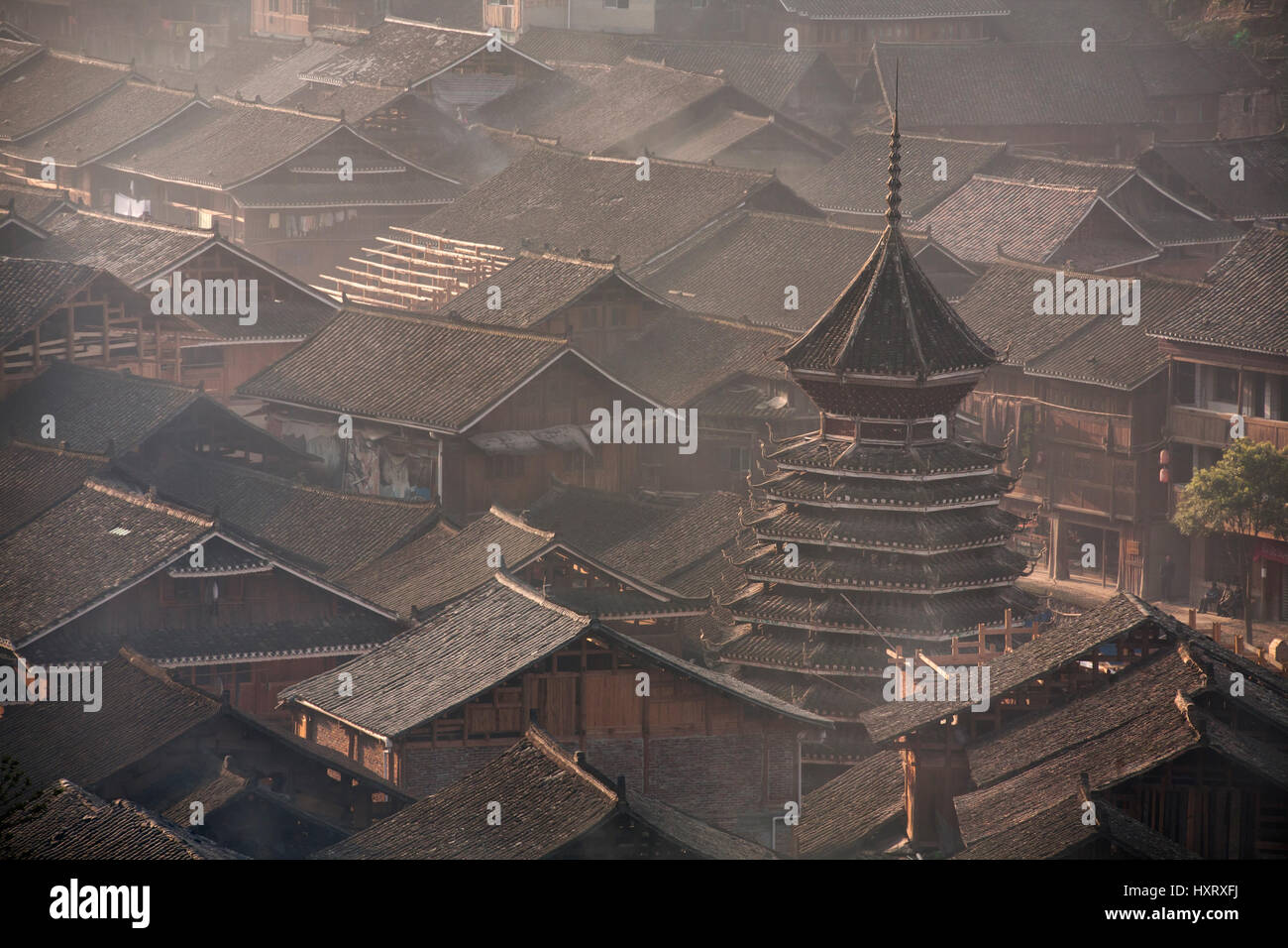 Zhaoxing Dong Village, Guizhou Province, China -  April 9, 2010: Tile roofs of wooden houses of Chinese peasants in the village of Dong ethnic minorit Stock Photo