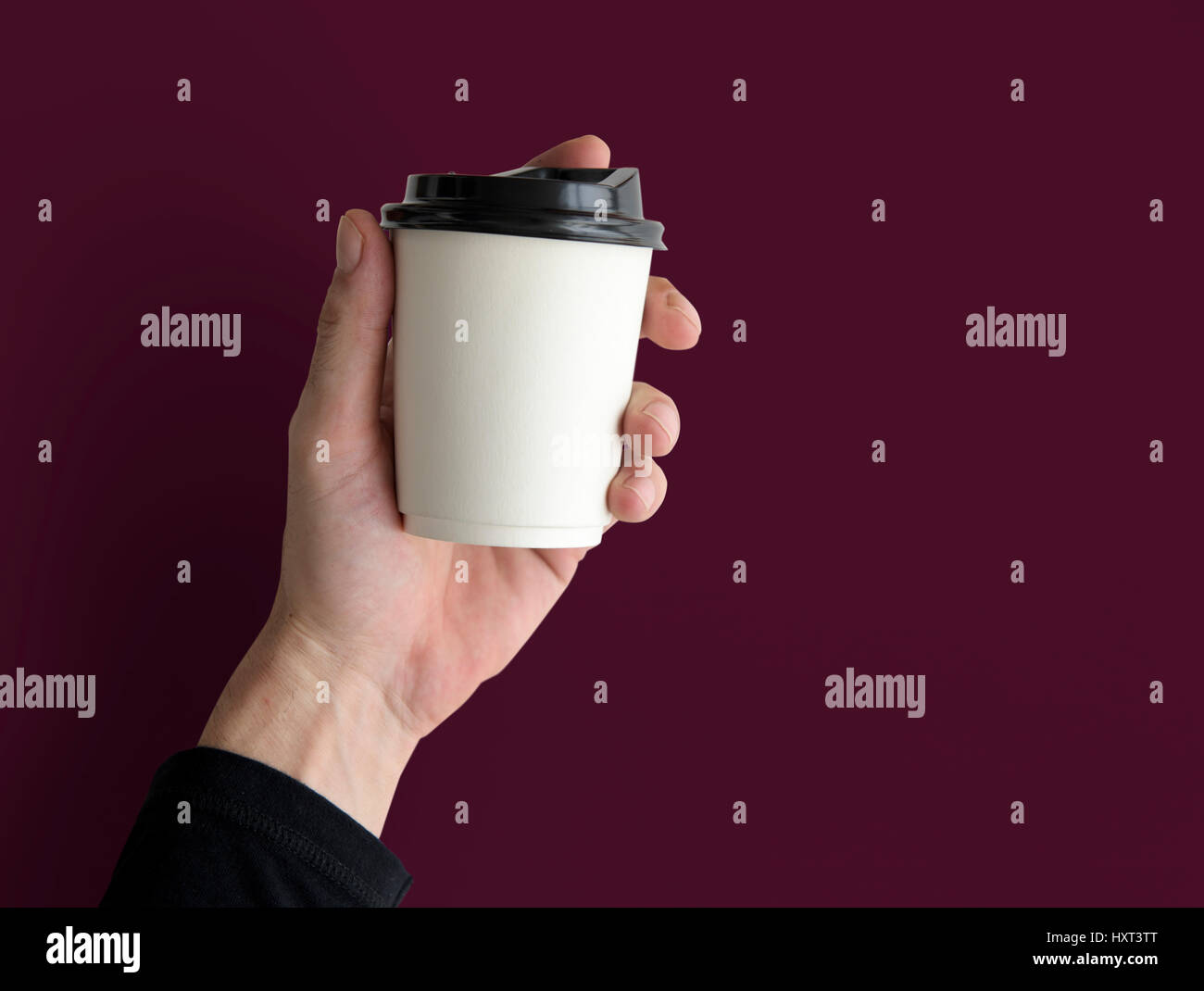 Human hand holding coffee cup hi-res stock photography and images - Alamy