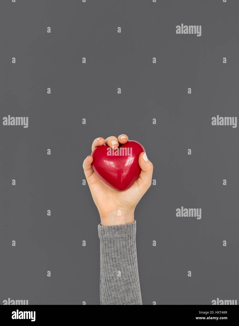 Holding heart love hi-res stock photography and images - Alamy