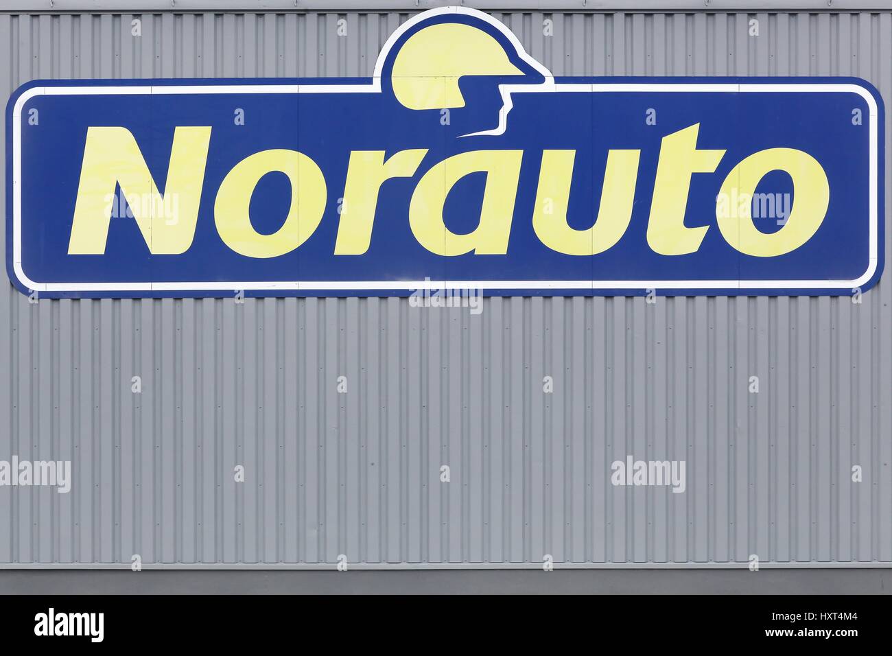 Orleans, France - March 19, 2017: Norauto logo on a wall. Norauto is a French based company which focuses on car repairs and car accessories Stock Photo