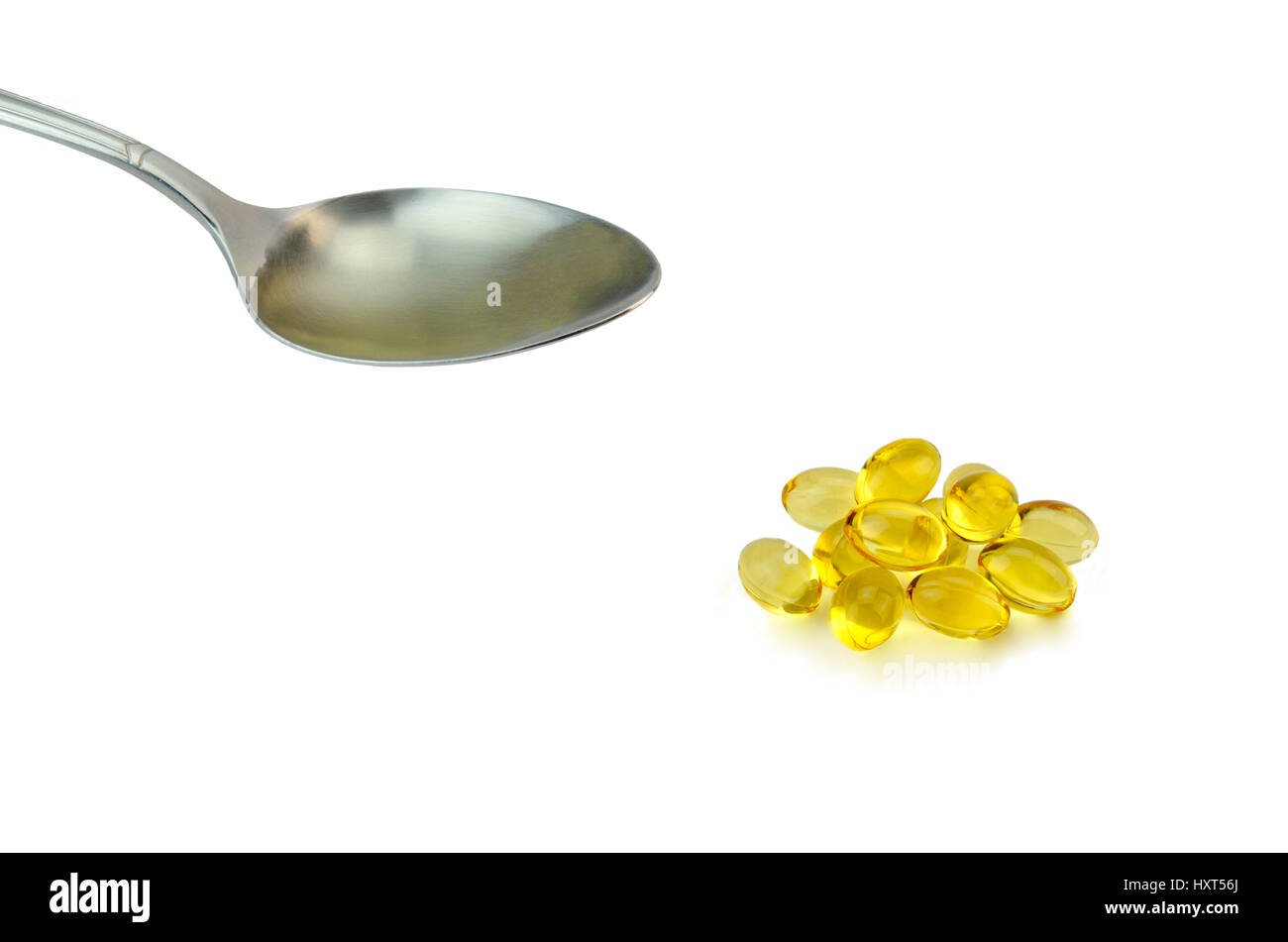 Liquid and in capsules Cod liver oil Stock Photo Alamy