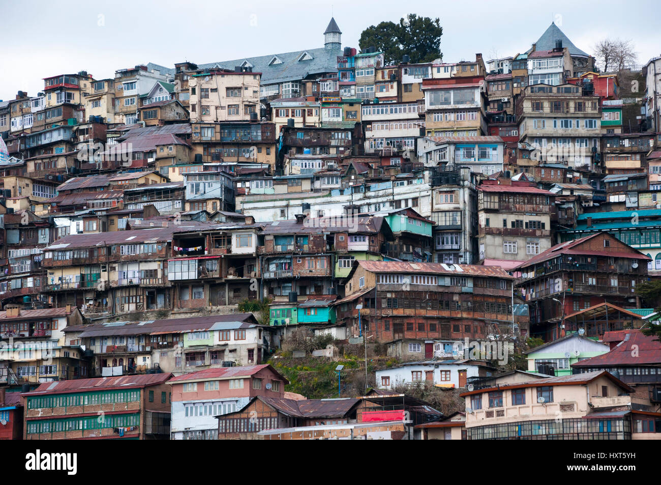 Crowded housing on the hillside in Shimla, Himachal Pradesh, India. Stock Photo