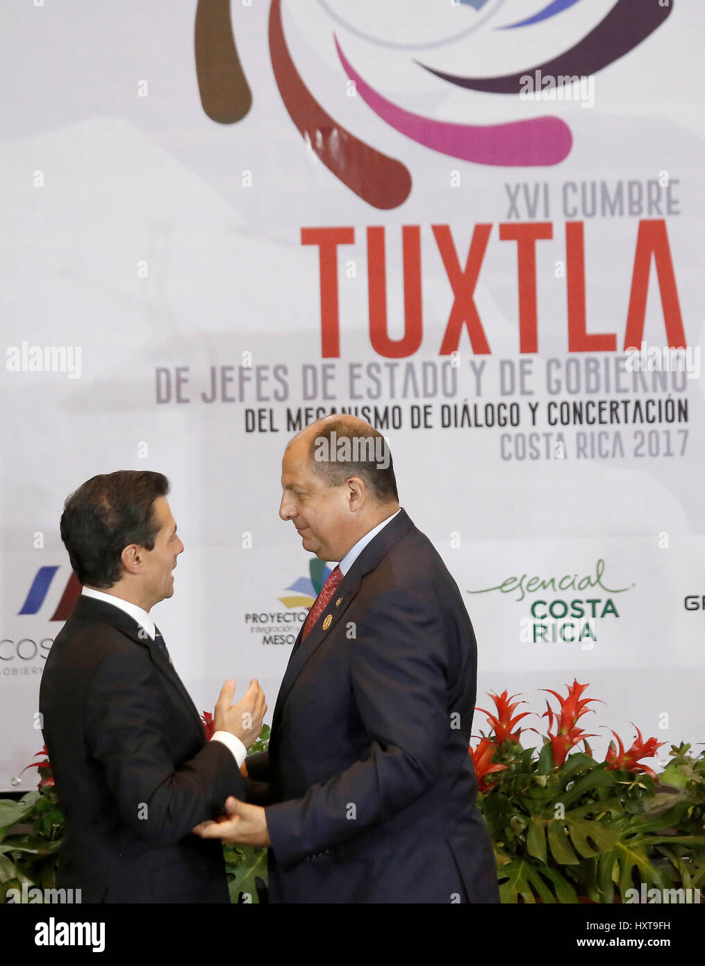 San Jose, Costa Rica. 29th Mar, 2017. Mexico's President Enrique Pena Nieto (L) talks with his Costa Rican counterpart Luis Guillermo Solis at the 16th Tuxtla Summit of Central American and Latin American leaders, in San Jose, Costa Rica, March 29, 2017. Credit: Kent Gilbert/Xinhua/Alamy Live News Stock Photo