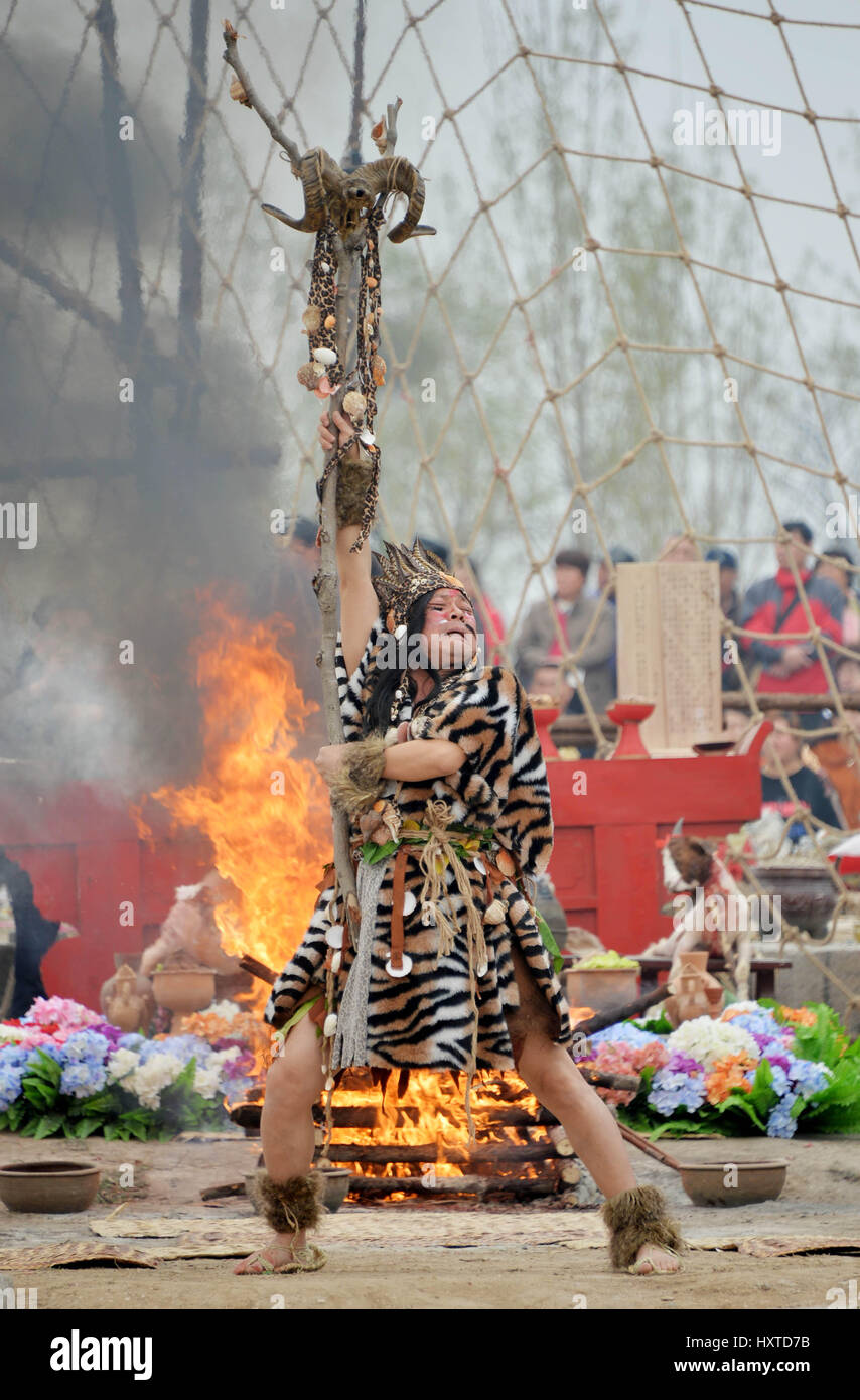 Jinan, China's Shandong Province. 30th Mar, 2017. An actor performs ancient ceremony to worship Fuxi and Nuwa, ancestors of human in Chinese myth, in Zoucheng, east China's Shandong Province, March 30, 2017. More than 500 people gathered here to worship Fuxi and Nuwa. Credit: Zhu Zheng/Xinhua/Alamy Live News Stock Photo
