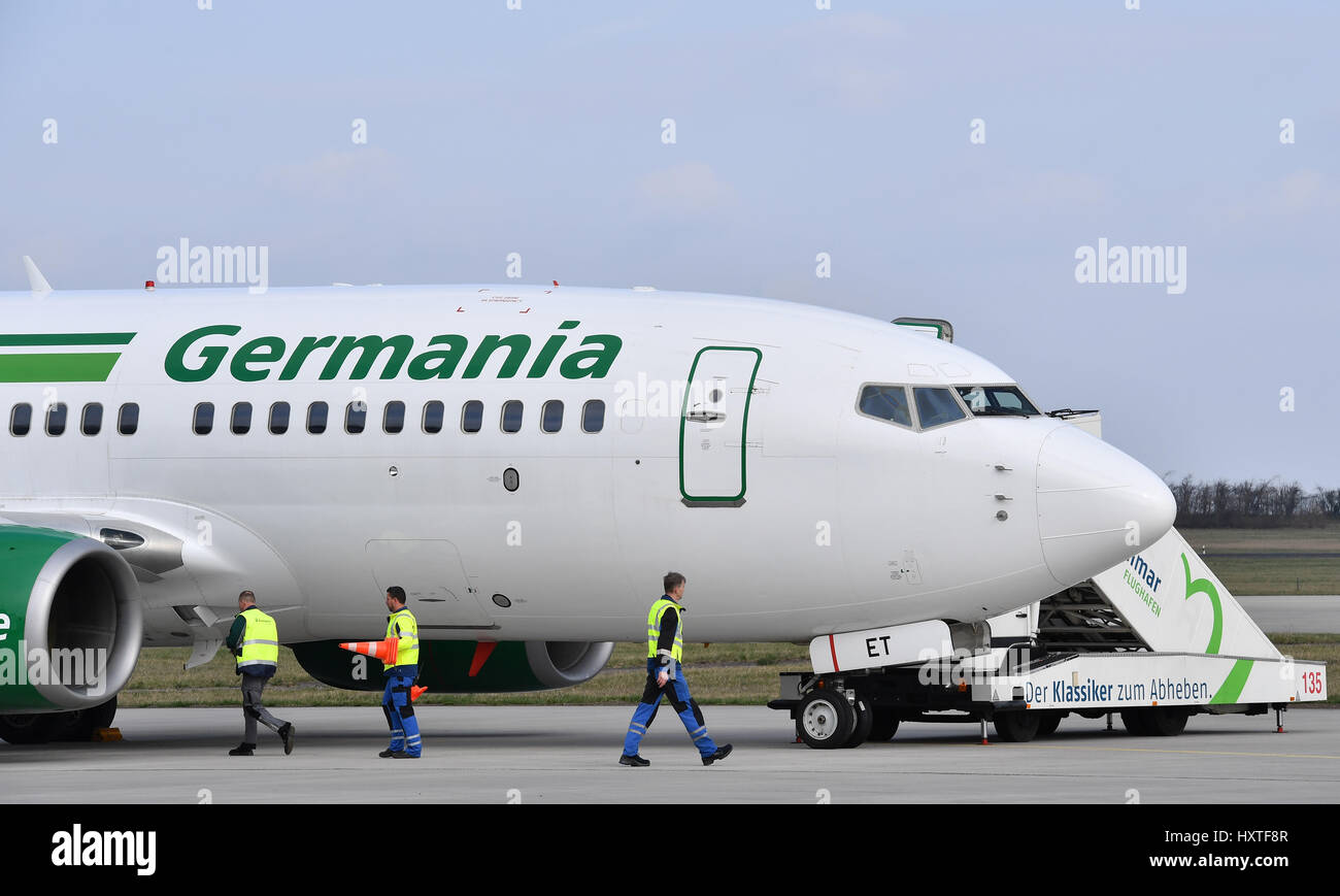 Erfurt, Germany. 29th Mar, 2017. A Boeing 737-700 belonging to Germania airlines in the airport in Erfurt, Germany, 29 March 2017. The company is stationing a second plane at the airport and will now be the sole renter of hanger 1. Photo: Martin Schutt/dpa-Zentralbild/dpa/Alamy Live News Stock Photo