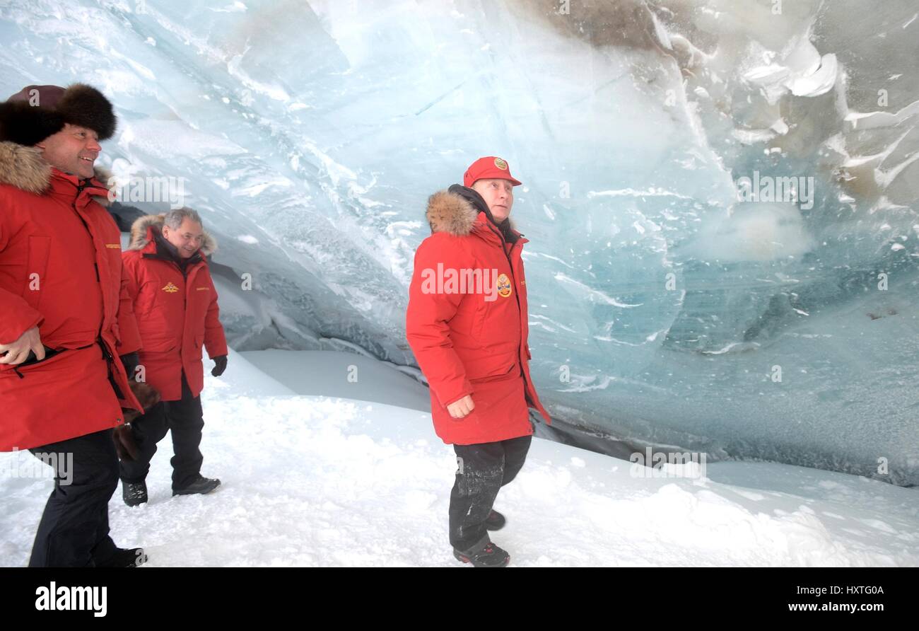 Alexandra Land, Russia. 29th Mar, 2017. Russian President Vladimir Putin enters an ice cave in
