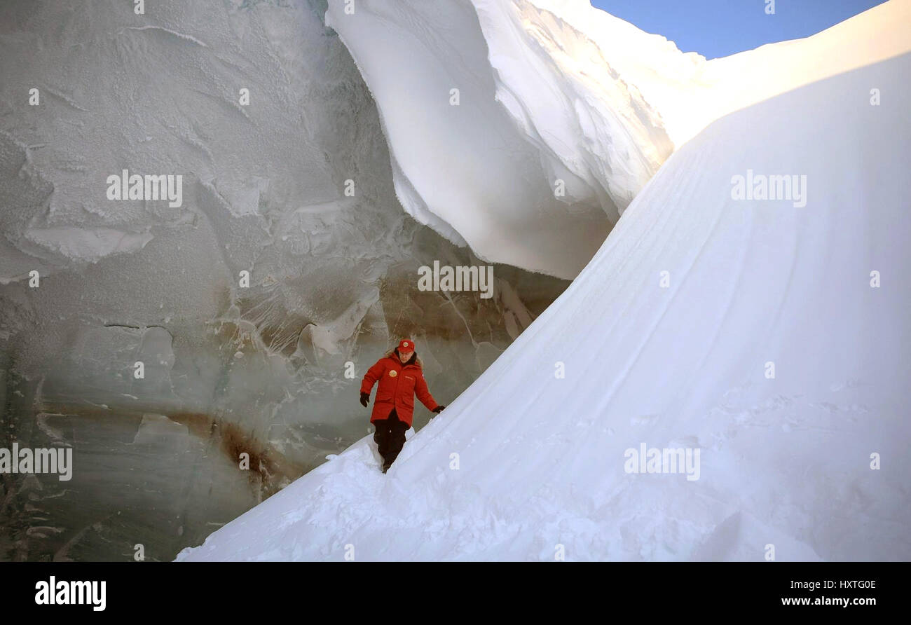 Alexandra Land, Russia. 29th Mar, 2017. Russian President Vladimir Putin explores an ice cave in