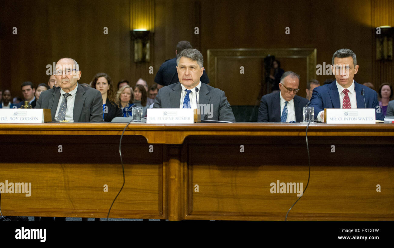 Washington DC, USA. 30th March 2017. United States Senate Select Committee on Intelligence conducts an open hearing titled 'Disinformation: A Primer in Russian Active Measures and Influence Campaigns' on Capitol Hill in Washington, DC on Thursday, March 30, 2017. The first panel to testify, from left to right: Dr. Roy Godson, Professor of Government Emeritus, Georgetown University; Dr. Eugene Rumer, Director of Russia and Eurasia Program, Carnegie Endowment for International Peace; and Clinton Watts, Senior Fellow, Credit: Ron Sachs/CNP /MediaPunch/Alamy Live News Stock Photo