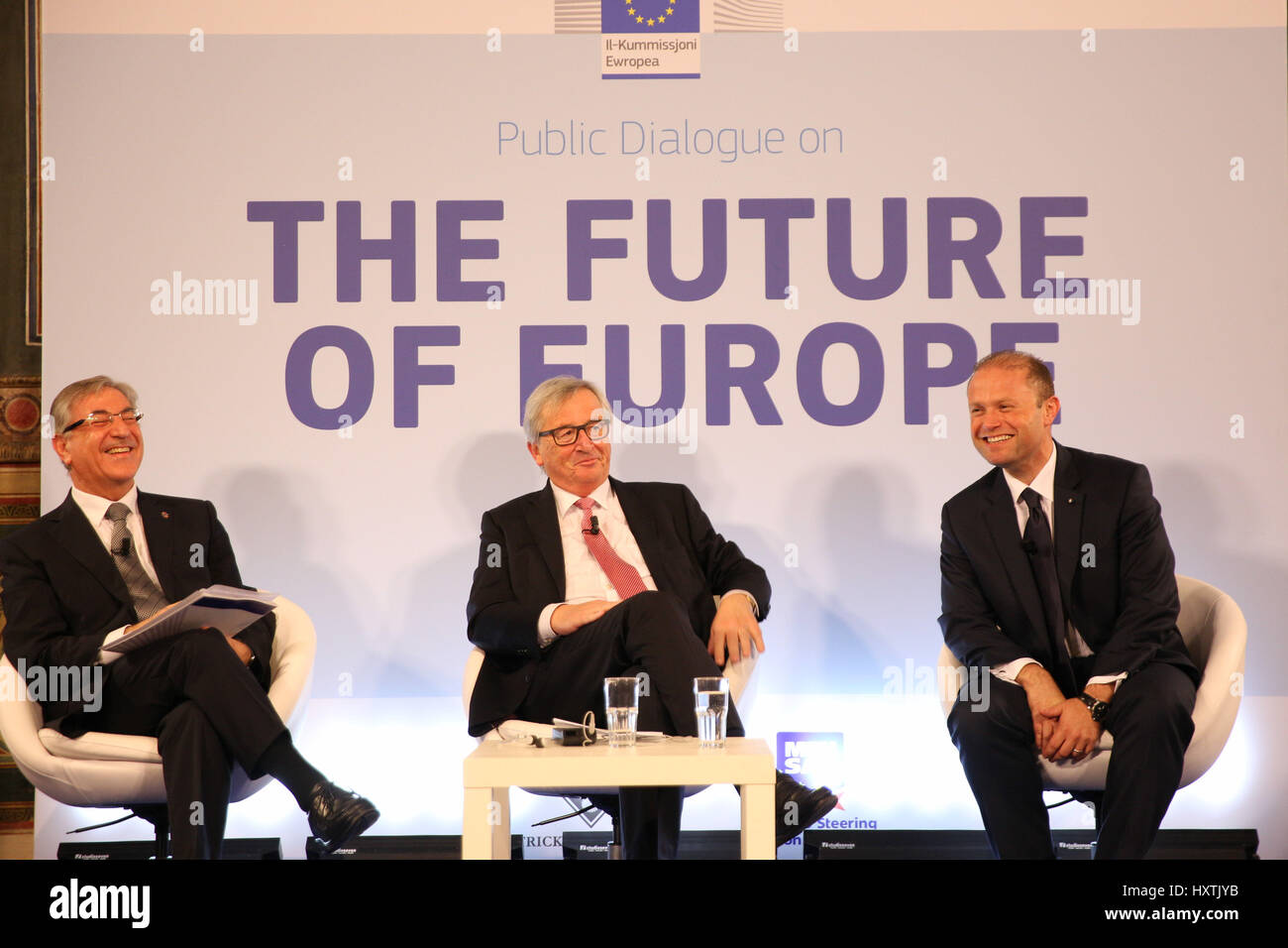 Valletta, Malta. 29th Mar, 2017. European Commission President Jean-Claude  Juncker (C) and Maltese Prime Minister Joseph Muscat (R) attend the Public  Dialogue of the Future of Europe in Valletta, capital of Malta,