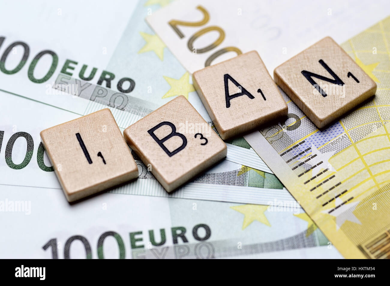 The word IBAN in letters on bank notes, Das Wort IBAN in Buchstaben auf Geldscheinen Stock Photo