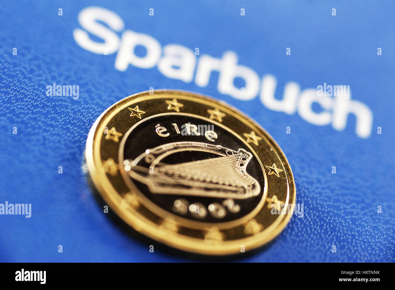 Irish euro coin one and savings book hi res stock photography and