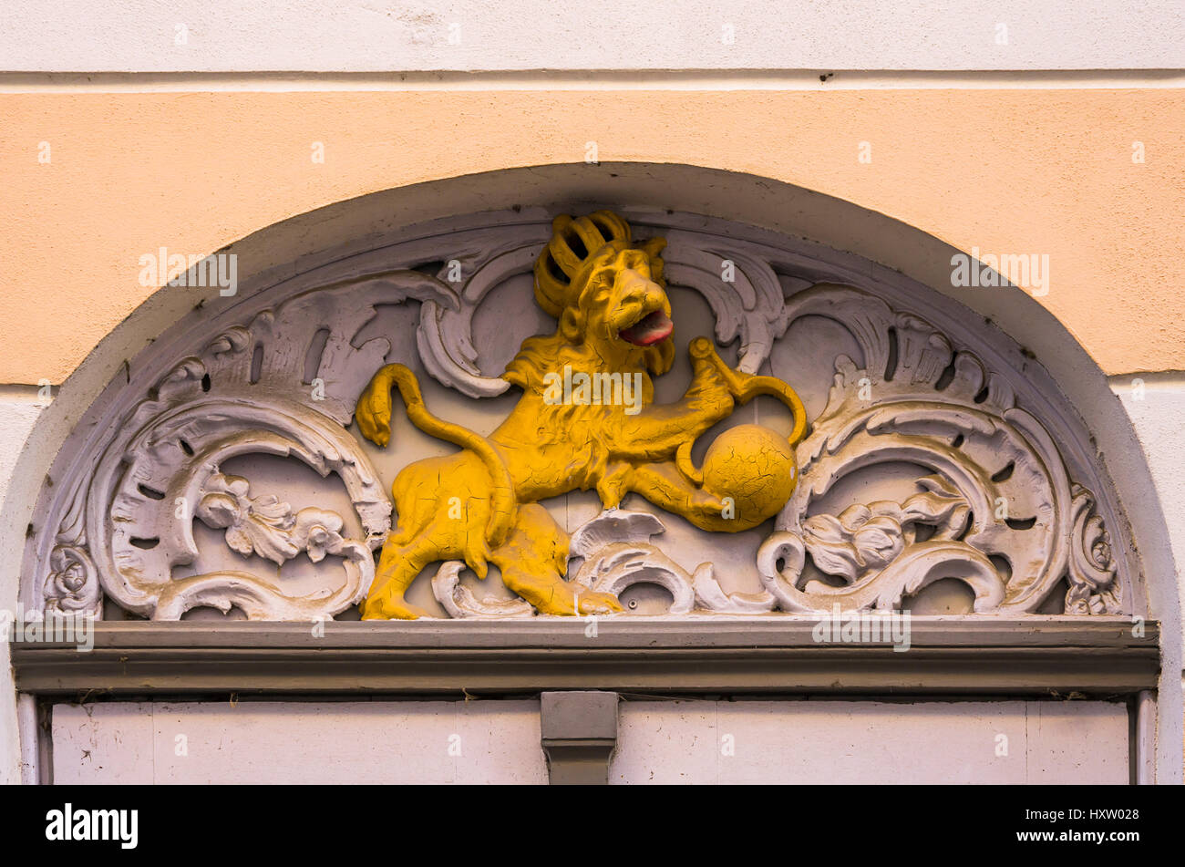 Historic round-arched door gable showing the sculpture of a lion, Hanseatic City of Stralsund, Mecklenburg-Pomerania, Germany. Stock Photo