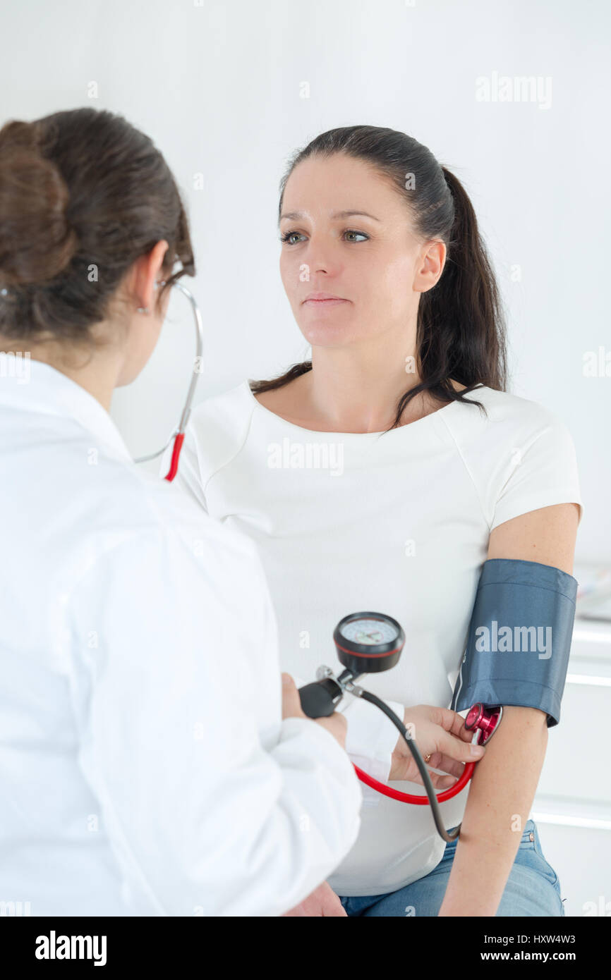 Asian woman testing blood hi-res stock photography and images - Alamy
