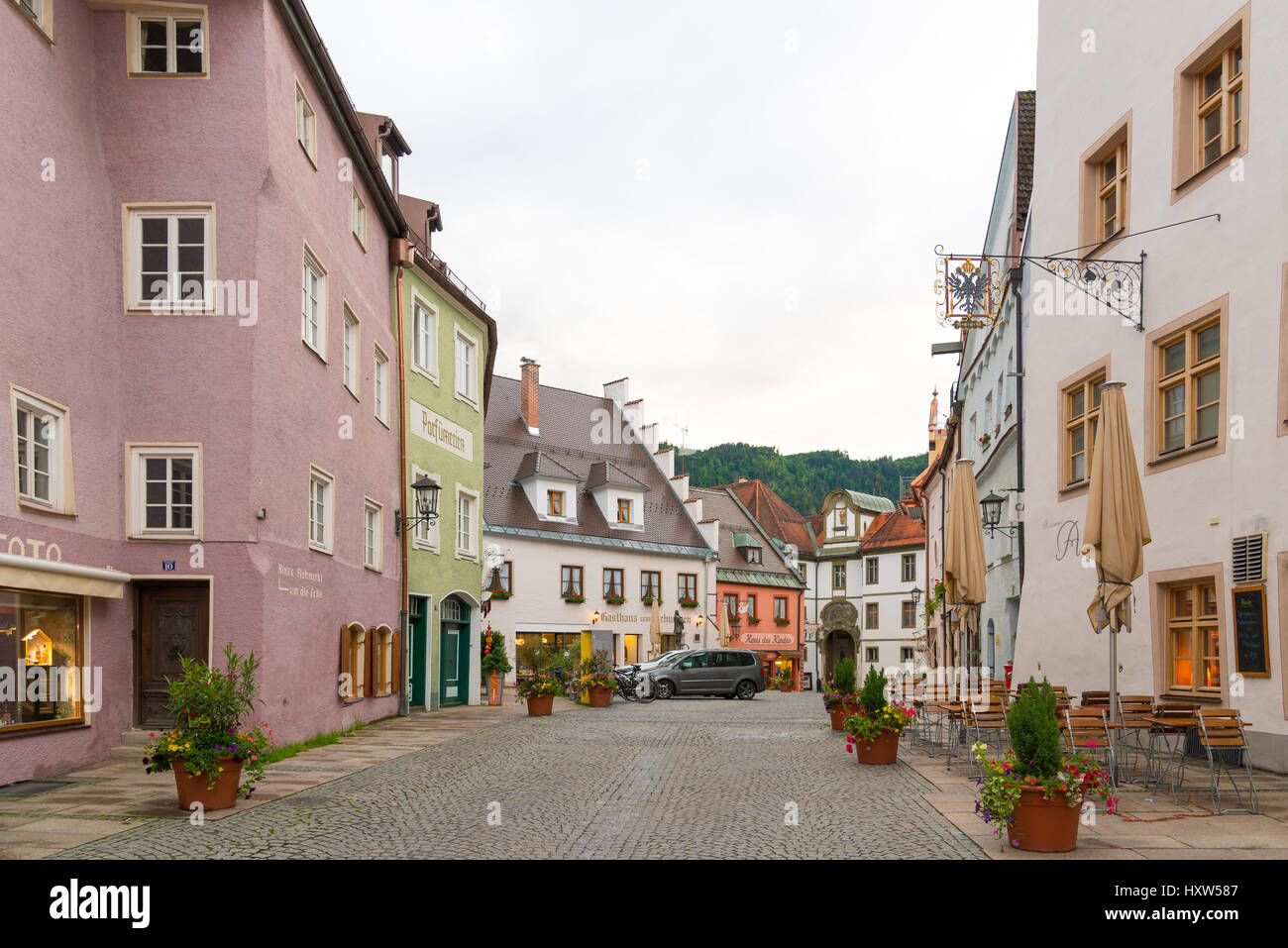 Fussen, Germany - June 4, 2016: View of pedestrian historical street in Fussen with typical bavarian architecture buildings. Stock Photo