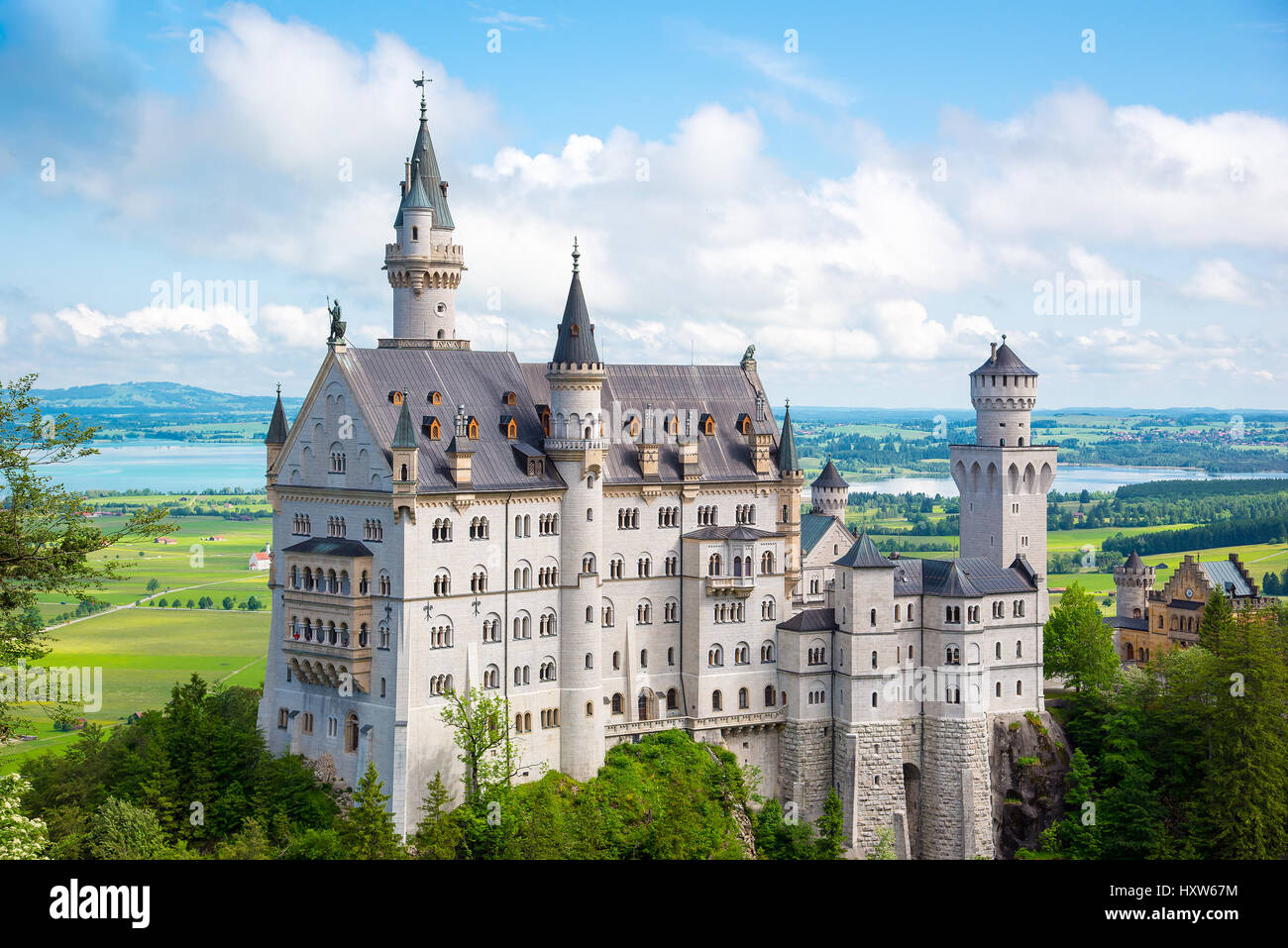 Beautiful view of world-famous Neuschwanstein Castle, the 19th century Romanesque Revival palace built for King Ludwig II, with scenic mountain landsc Stock Photo