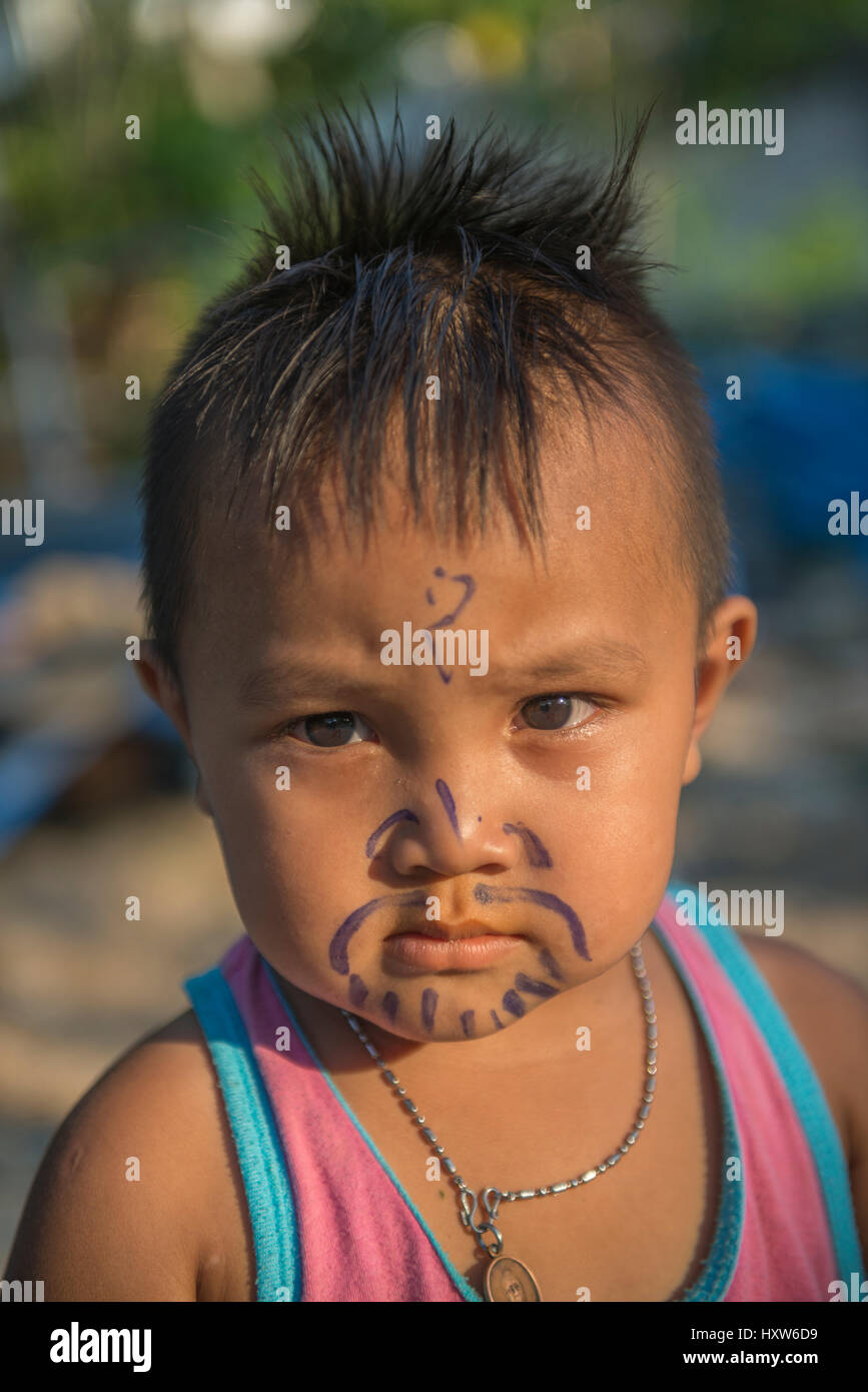 A funny Thai little boy in Phuket, Thailand. 09-Mar-2017 Stock Photo