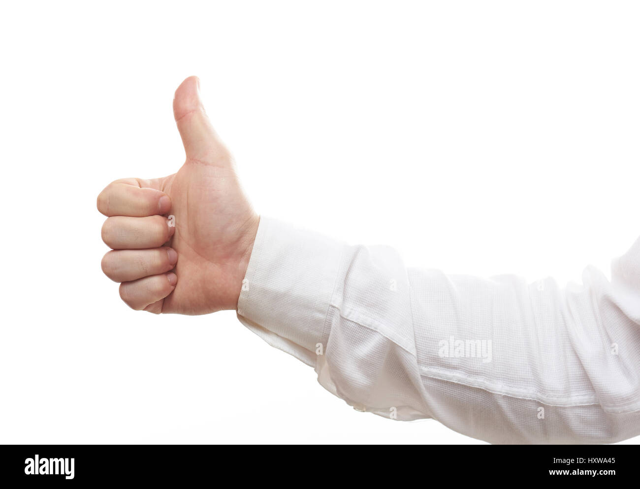 Thumb up isolated close-up on white background. Sign of success Stock Photo