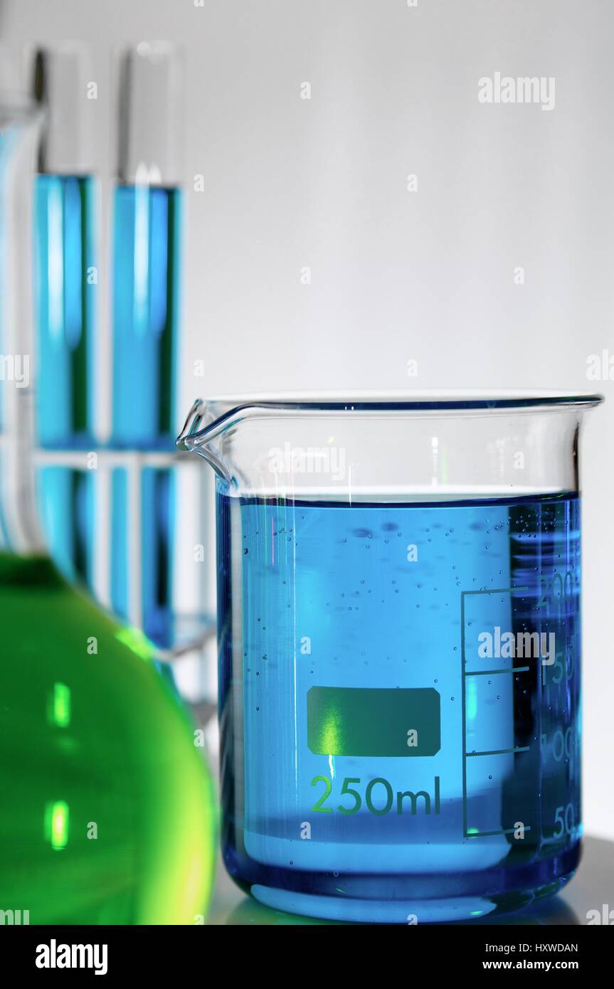 blue test tubes and bottles with white background Stock Photo Alamy