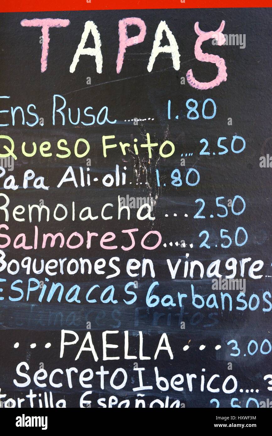 foreground of a poster of the menu in a typical Spanish restaurant, Sevilla, Andalusia, Spain
