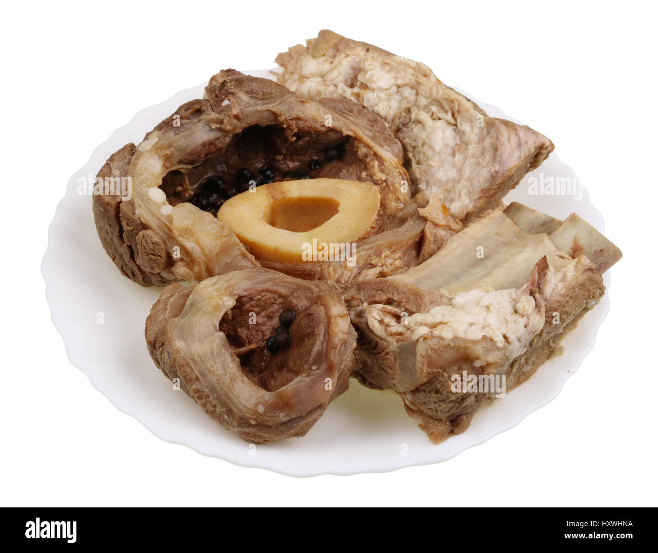 Boiled meat of beef ribs and leg with a bonel - a basis of dietary food for hemoglobin restoration. Isolated Stock Photo
