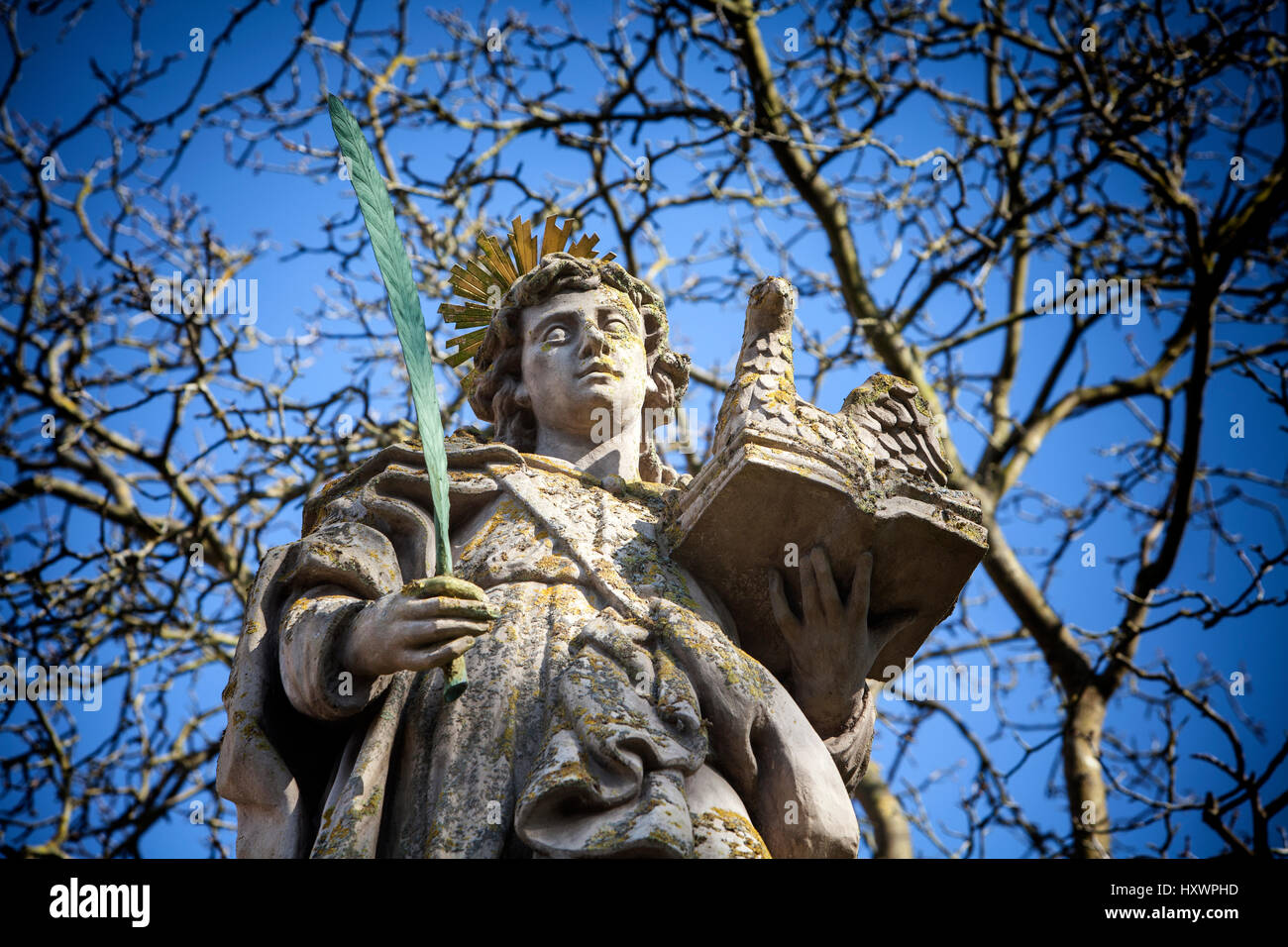 An angel in front of the abbey church St. Stephanus and St. Vitus, Abbey Castle Corvey in Hoexter, Weserbergland, North Rhine Westphalia, Germany, Eur Stock Photo