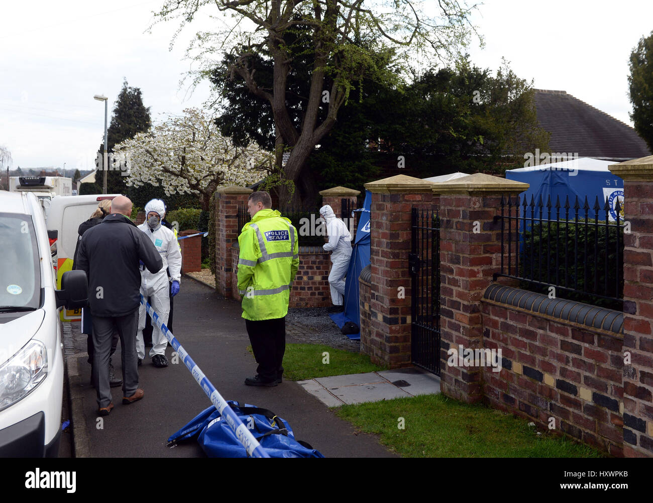 Police activity near the scene where a 13yearold boy and his mother