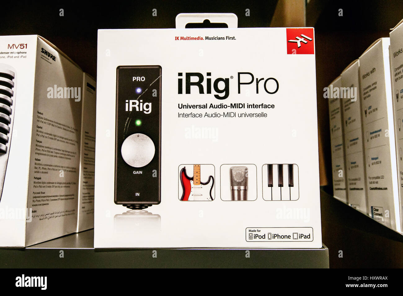 iRig Pro, a universal Audio-MIDI interface device is offered for sale in an Apple store. Stock Photo