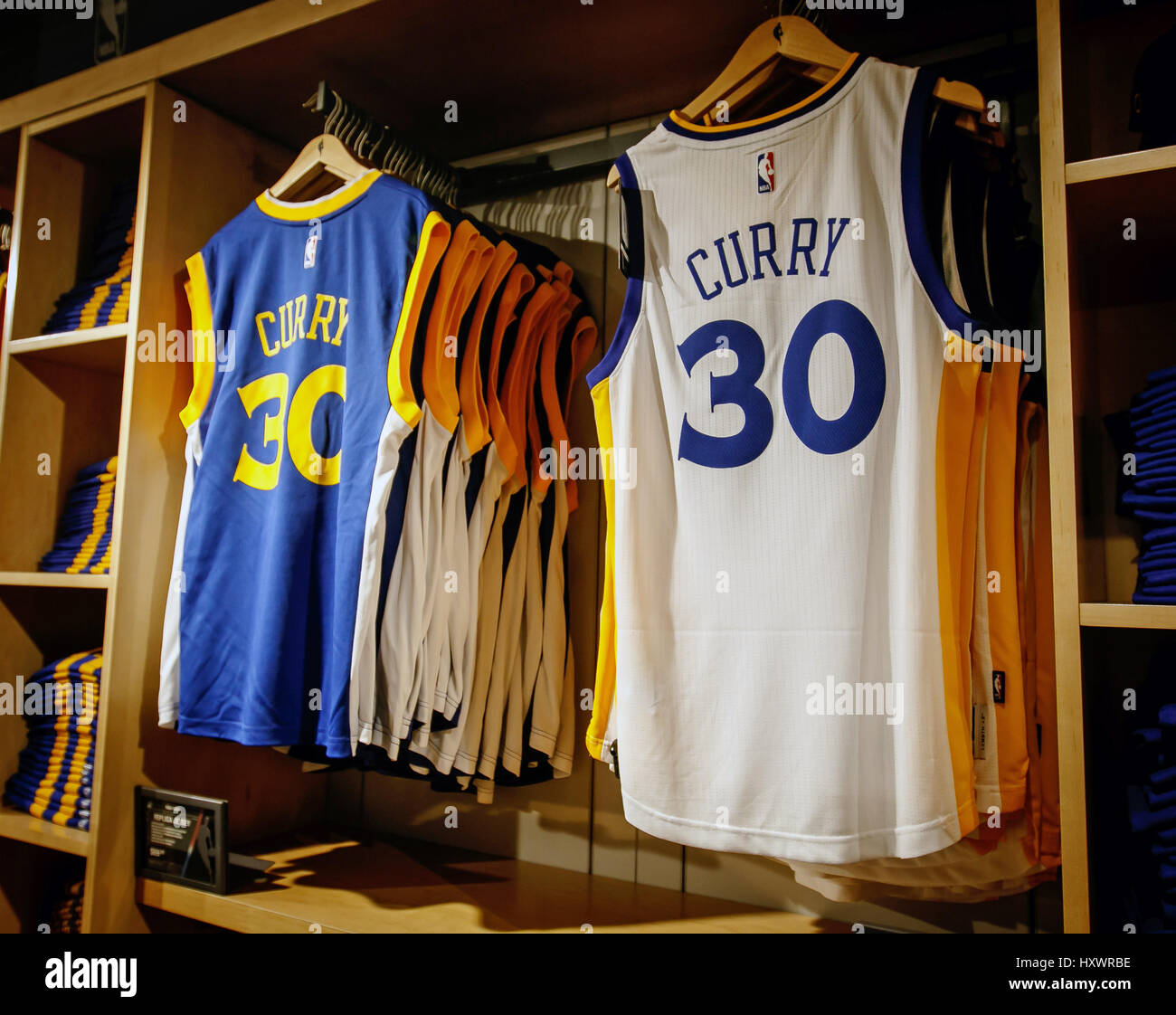 Replica jerseys of Curry of Golden State Warriors on sale in the