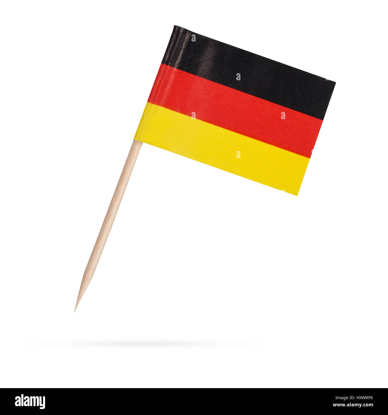 Miniature paper flag Germany. Isolated German flag pointer on white background. With shadow below Stock Photo