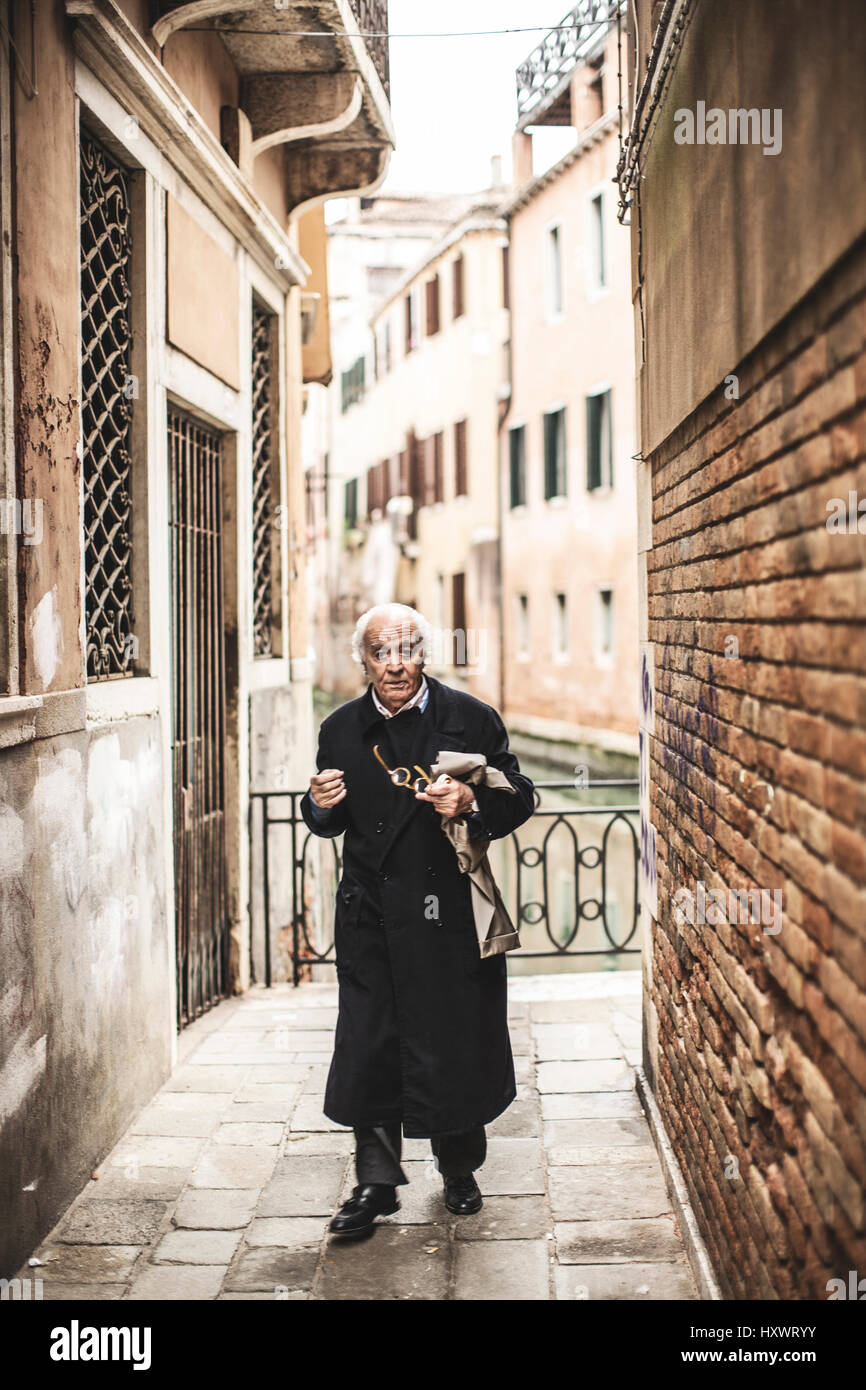 A well dressed Italian senior in Venice, Italy. Stock Photo