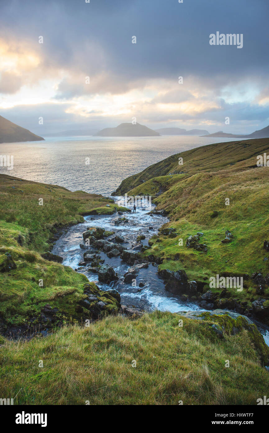 Beautiful landscape and pure water from the mountains in the Faroe Islands. Stock Photo