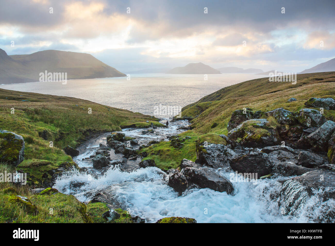 Beautiful landscape and pure water from the mountains in the Faroe Islands. Stock Photo