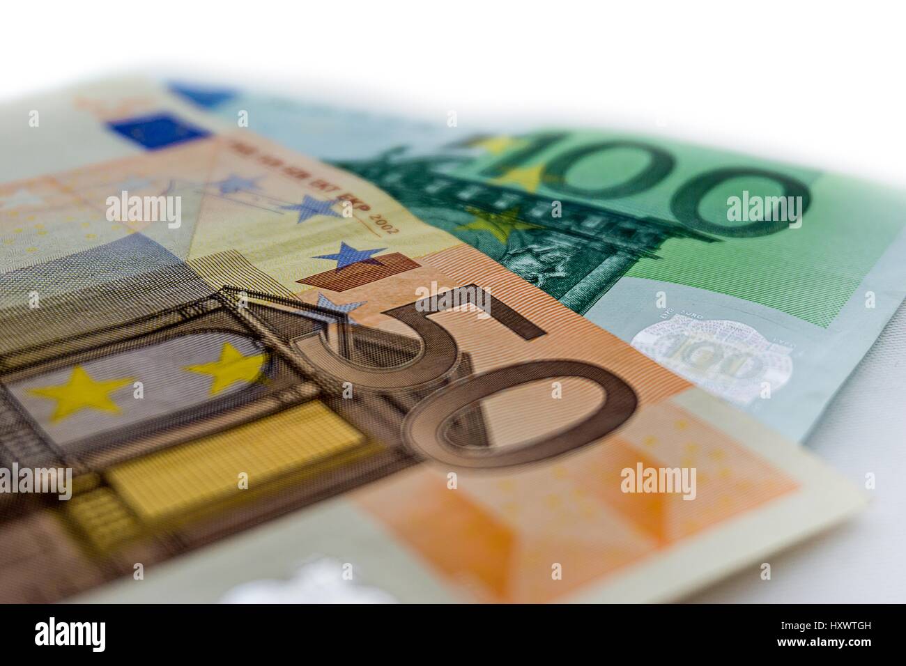 Euro bills on white background Stock Photo - Alamy