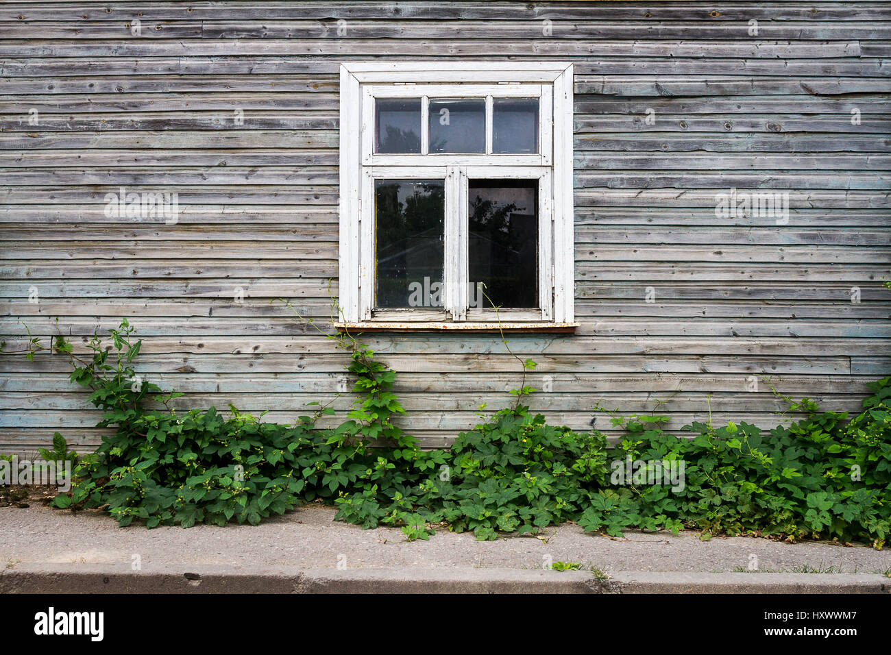 Old window on a aged wooden wall. Architectural detail. Architecture ...