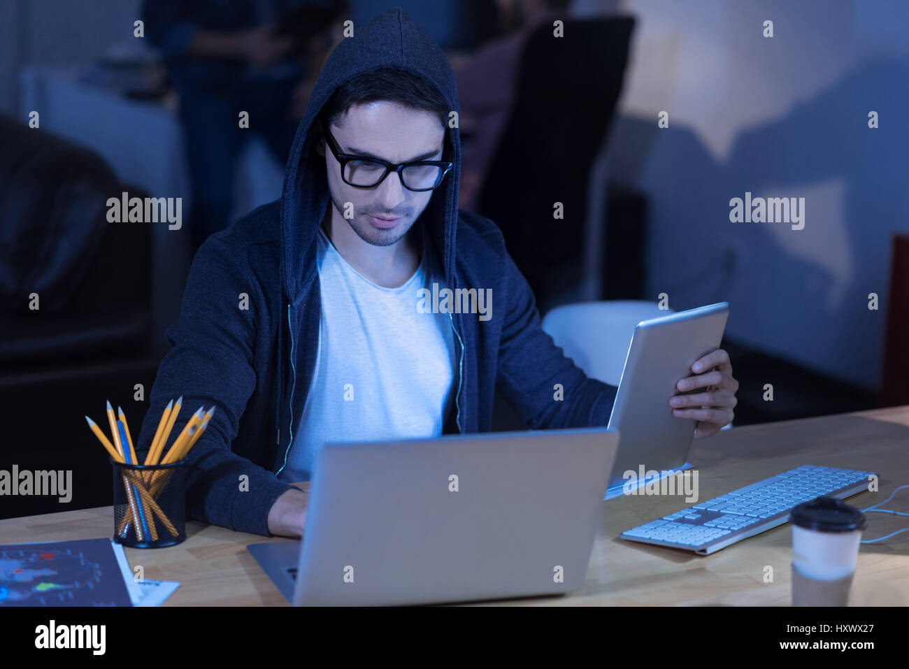 Serious smart man hacking into the government security system Stock Photo