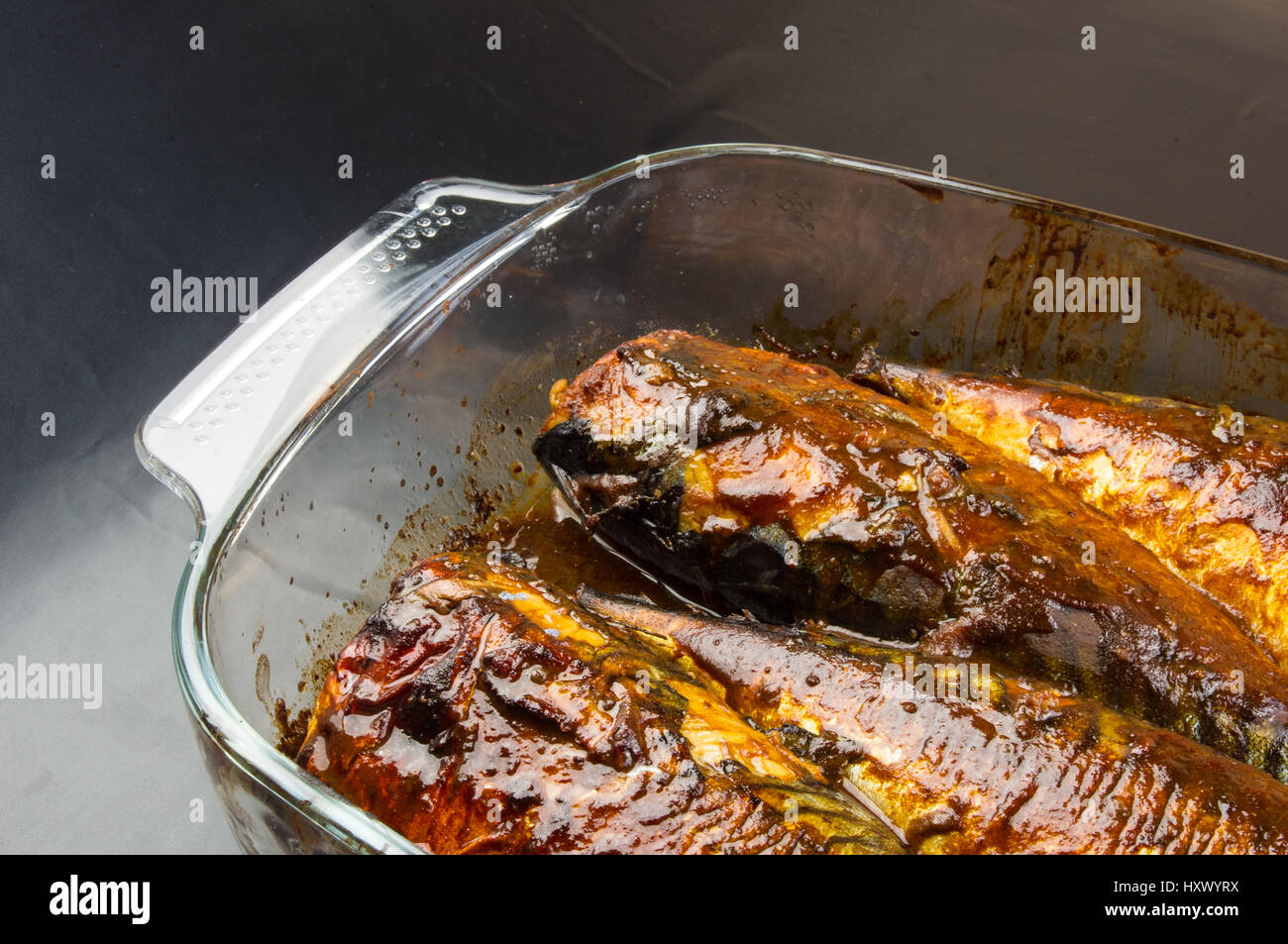 Mackerel in marinade, baked in a glass container Stock Photo Alamy