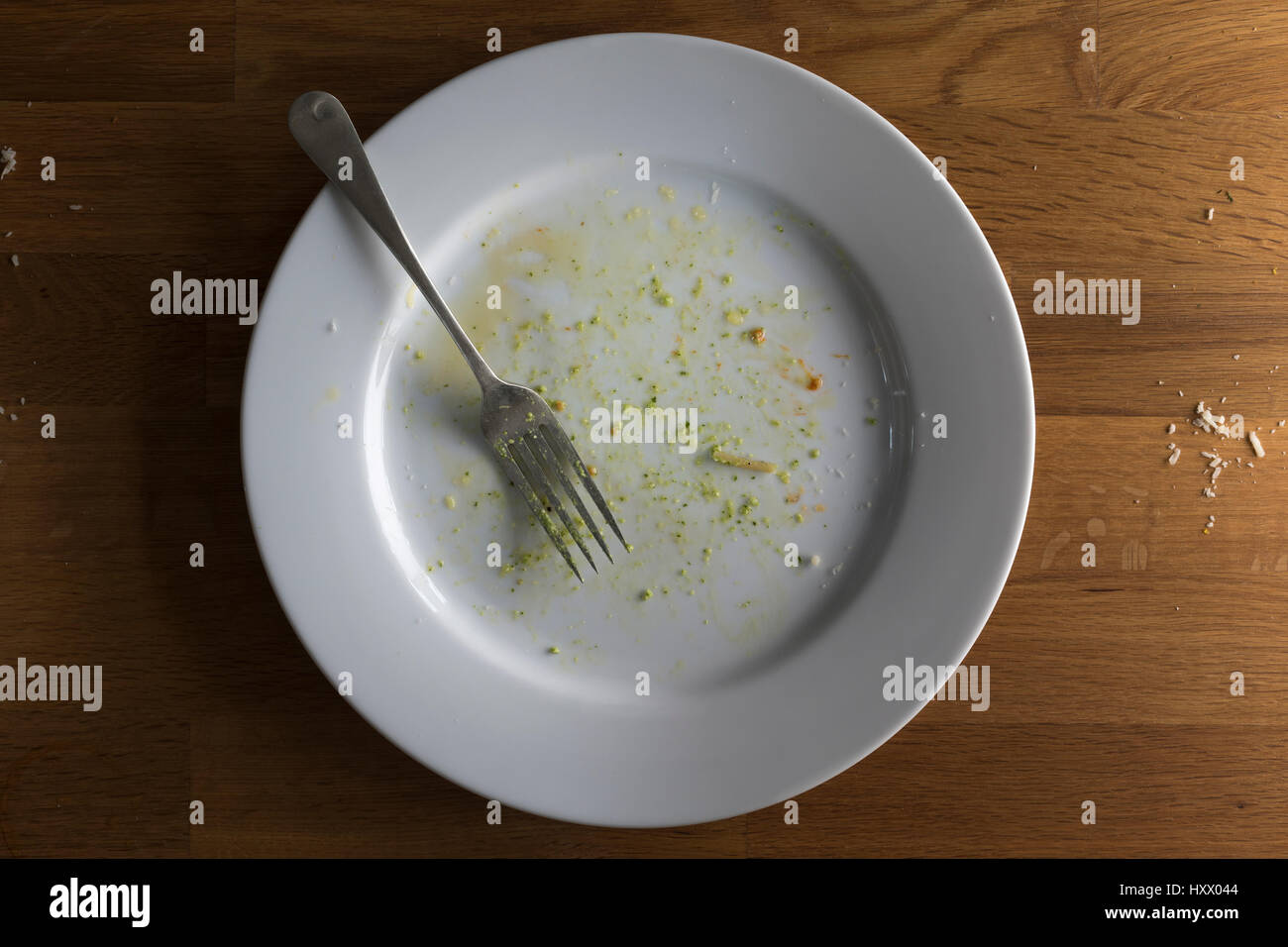 Ariel view of a plate after a meal has been clearly enjoyed and finished. Stock Photo