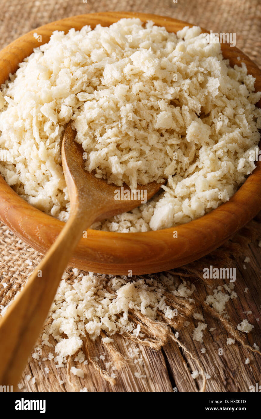 Crispy breadcrumbs Panko for breading in a bowl on the table, macro