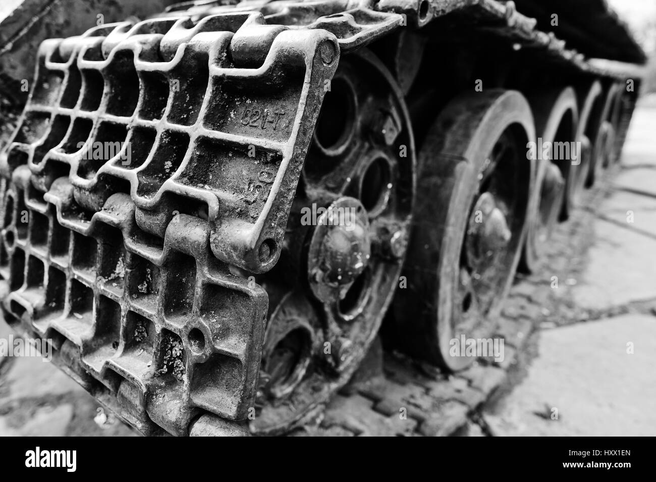 Detail shot with old vintage tank tracks and wheels. Stock Photo