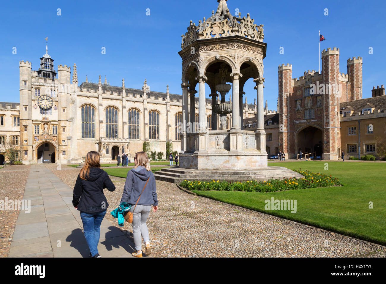 Trinity College Cambridge - People walking in Great Court, Trinity College, Cambridge University, Cambridge UK Stock Photo