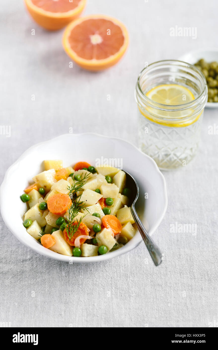A bowl of cooked winter root vegetables Stock Photo