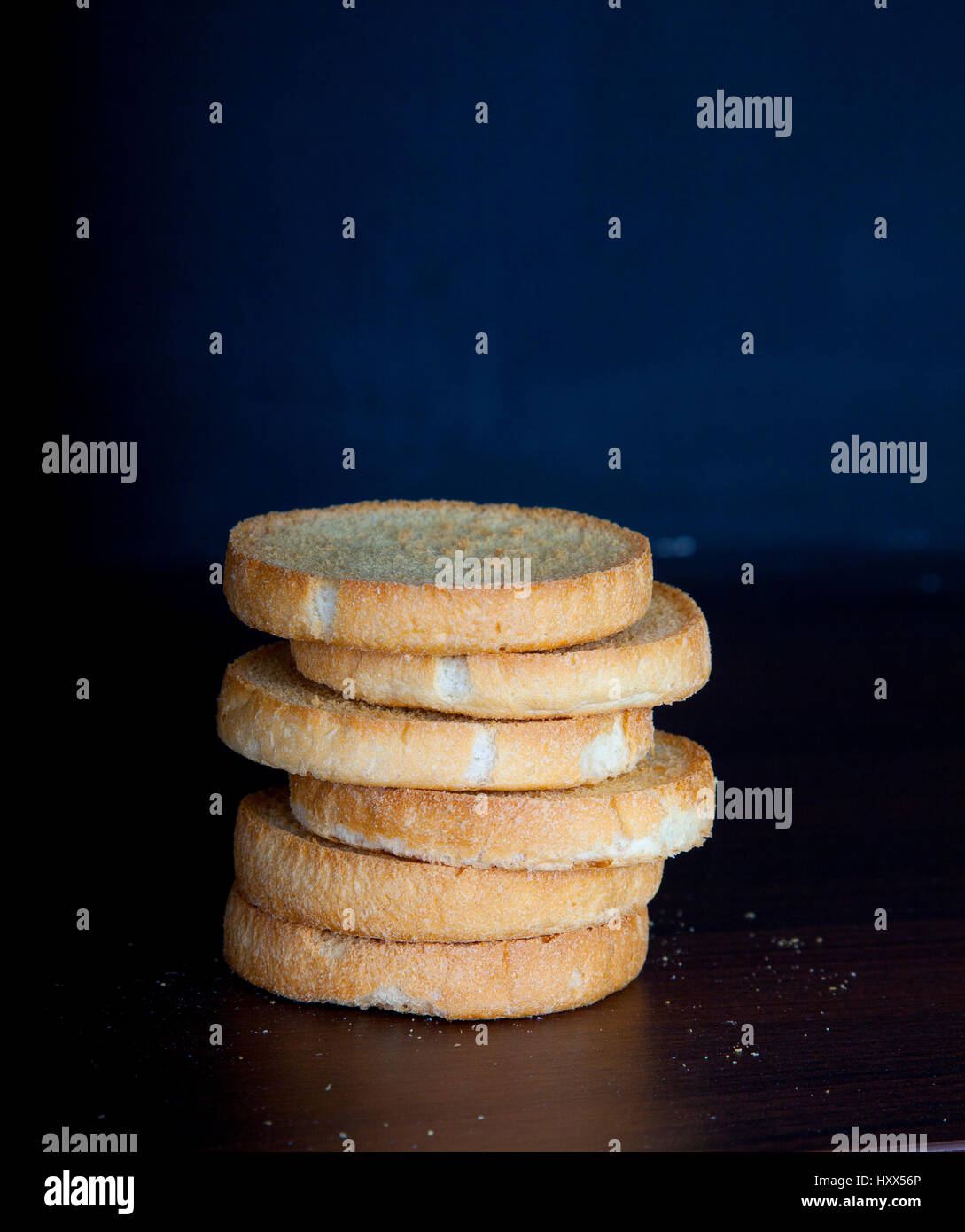 Pile of Dutch beschuit on black dark background Stock Photo Alamy