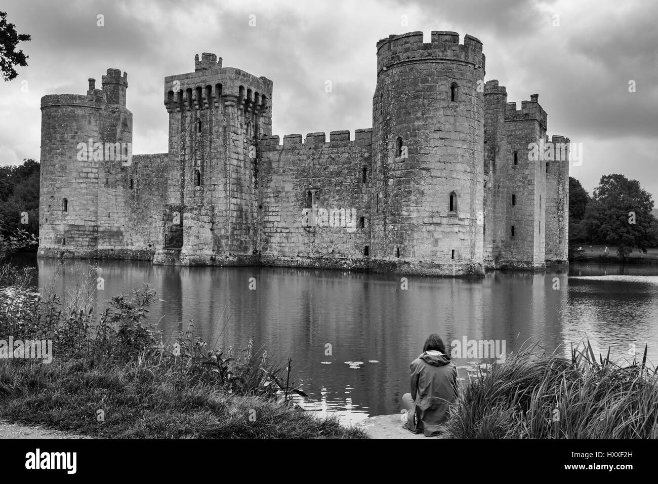Bodiam Castle, East Sussex, England, UK: 14th century moated castle ruins.  Black and white version.  MODEL RELEASED Stock Photo