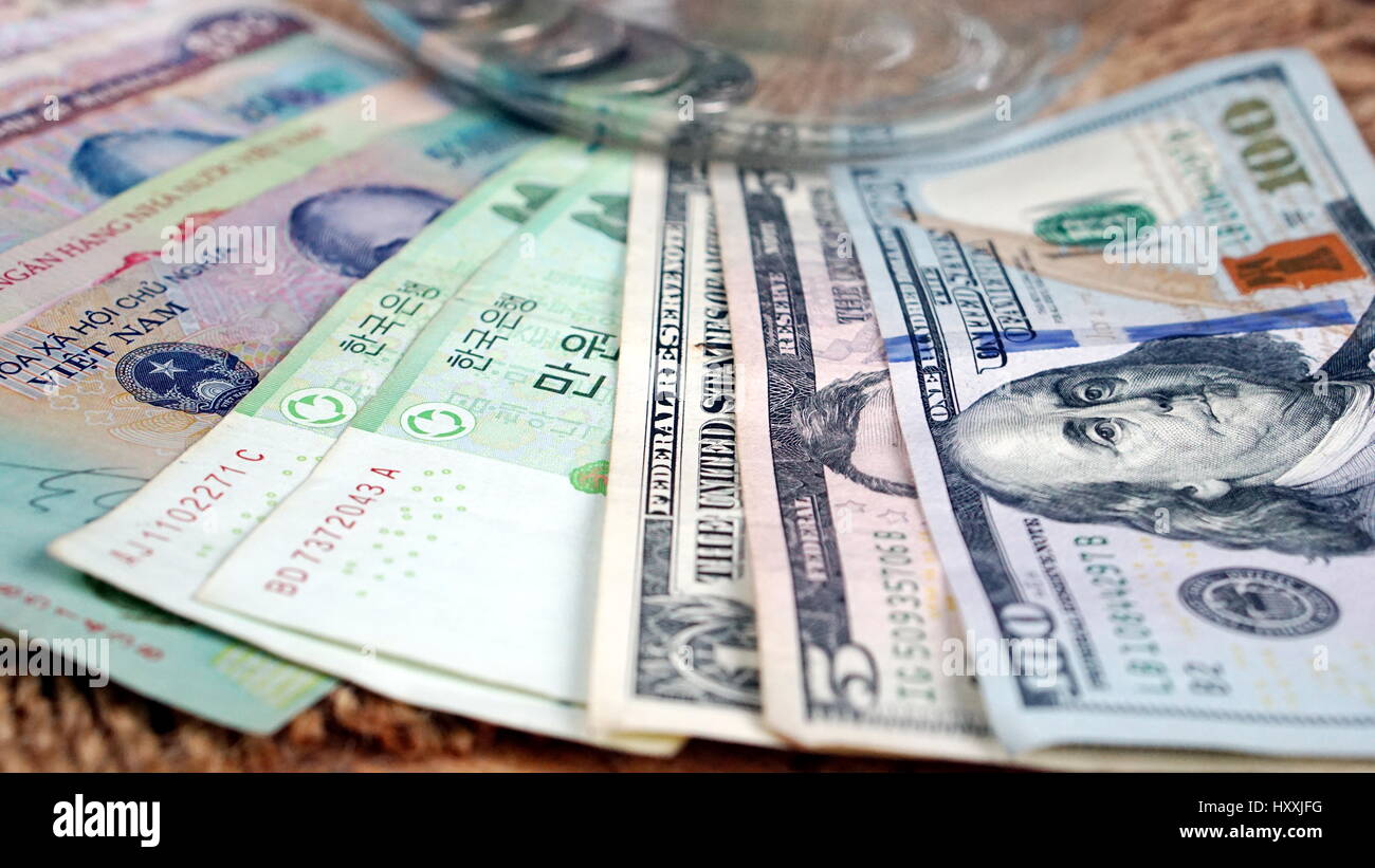 US dollars, Korean Won, Euro bills and some money bills and banknotes. Currency foreign exchange. Business and Financial or money management for inves Stock Photo