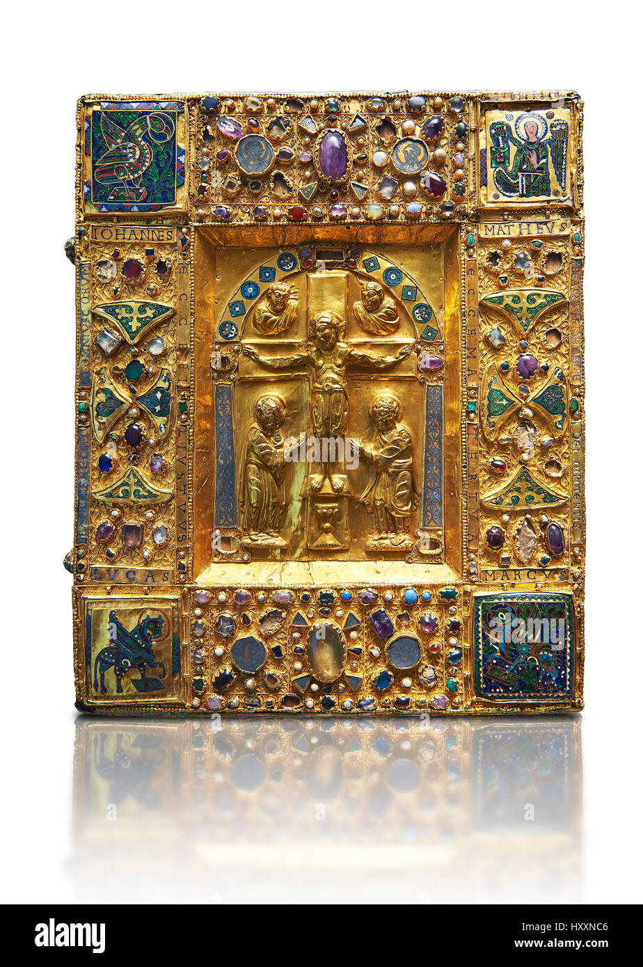 Medieval gilded manuscript cover depicting the Crucifixion. 11th century from the treasury of the Cathedral of Maastricht. Louvre Museum Paris Stock Photo