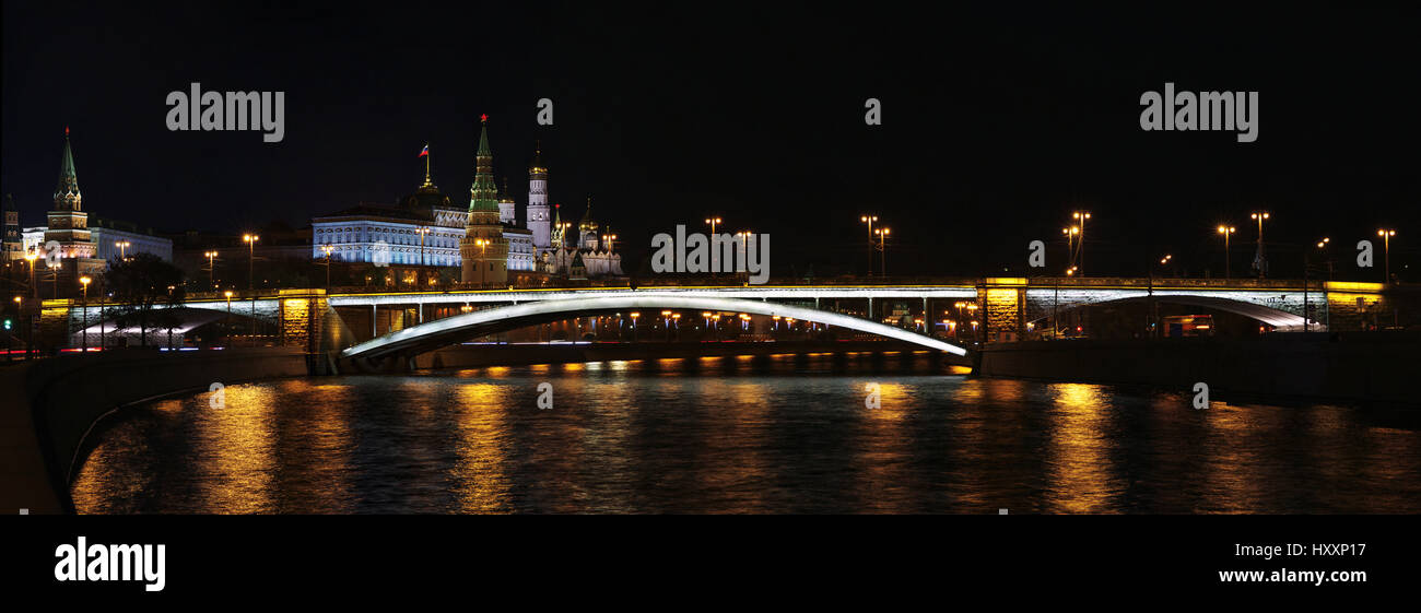 Bolshoy Kamenny Bridge is a steel arch bridge spanning Moskva River at the western end of the  Moscow Kremlin Stock Photo