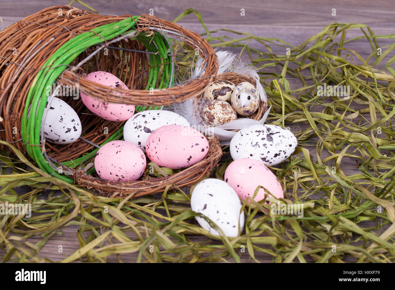 Easter decoration with eggs on a wooden background Stock Photo - Alamy