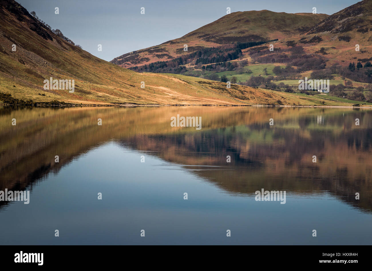 Reflections in the clear, calm lake at Crummock Water in Cumbria, Englsh Lake District, north west England, UK Stock Photo