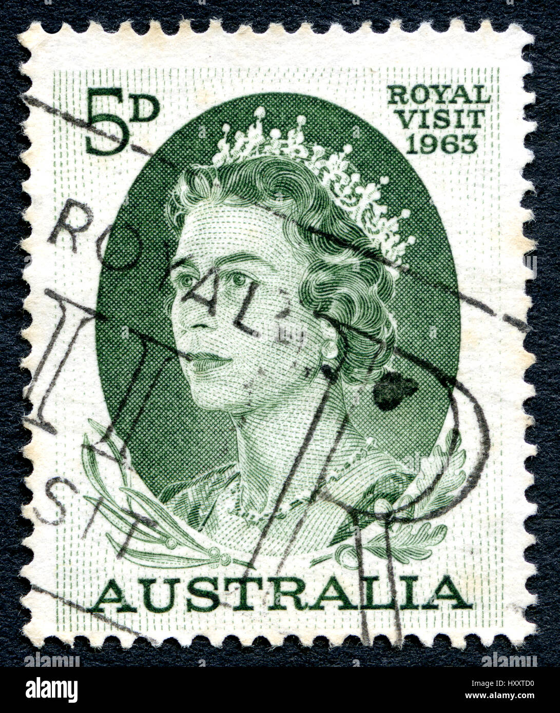 AUSTRALIA - CIRCA 1963: A used postage stamp from Australia, depicting a portrait of Queen Elizabeth II, commemorating the 1963 Royal Visit to Austral Stock Photo