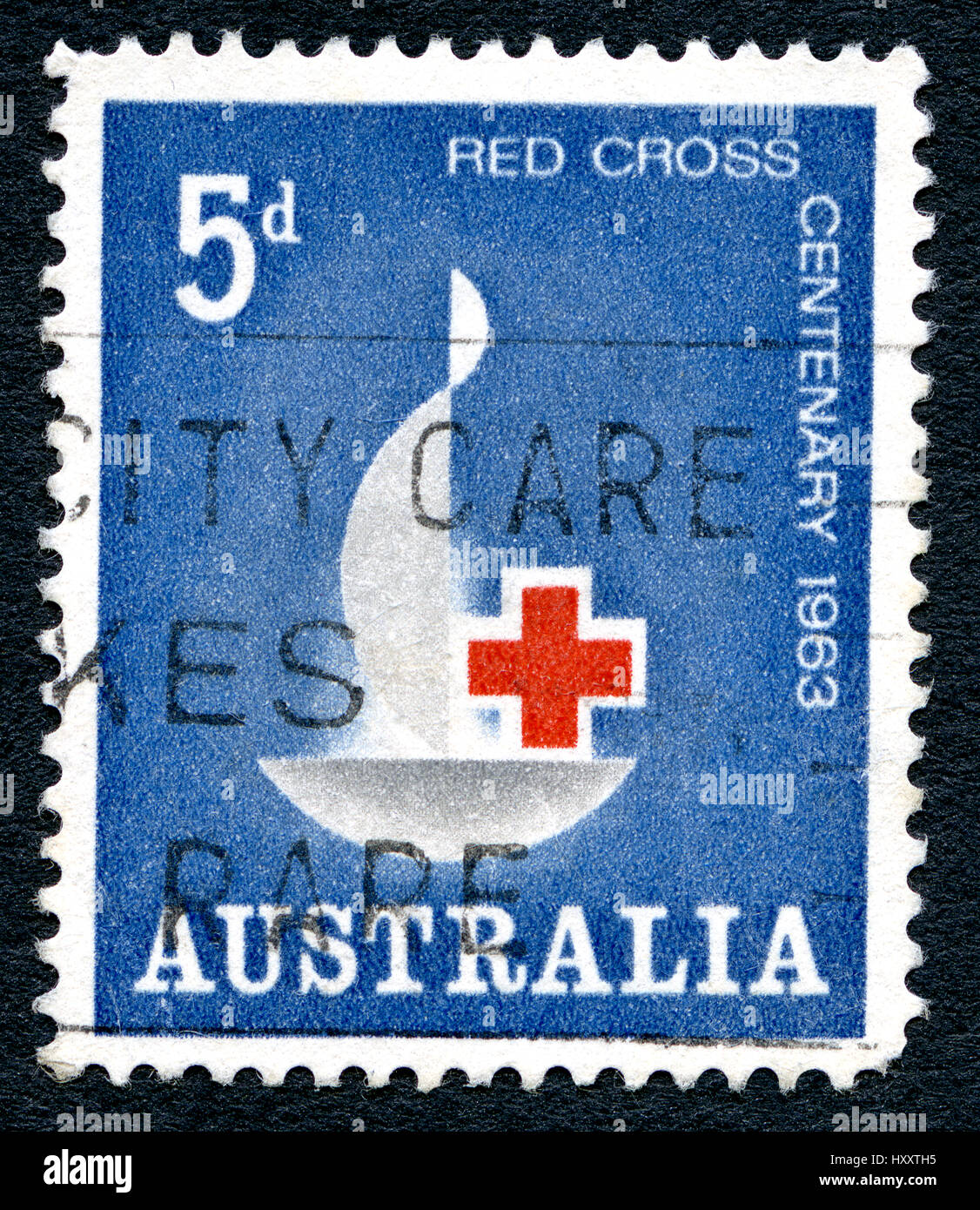 AUSTRALIA - CIRCA 1963: A used postage stamp from Australia, commemorating the centenary of the International Red Cross, circa 1963. Stock Photo